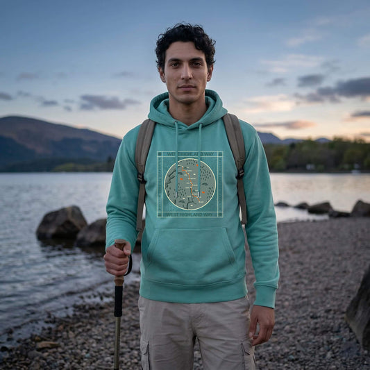 Close up of man wearing teal west highland way map organic cotton hoodie