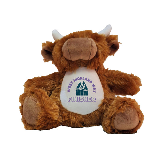 Front view of highland coo plush toy with West Highland Way Finisher design printed on his tummy.